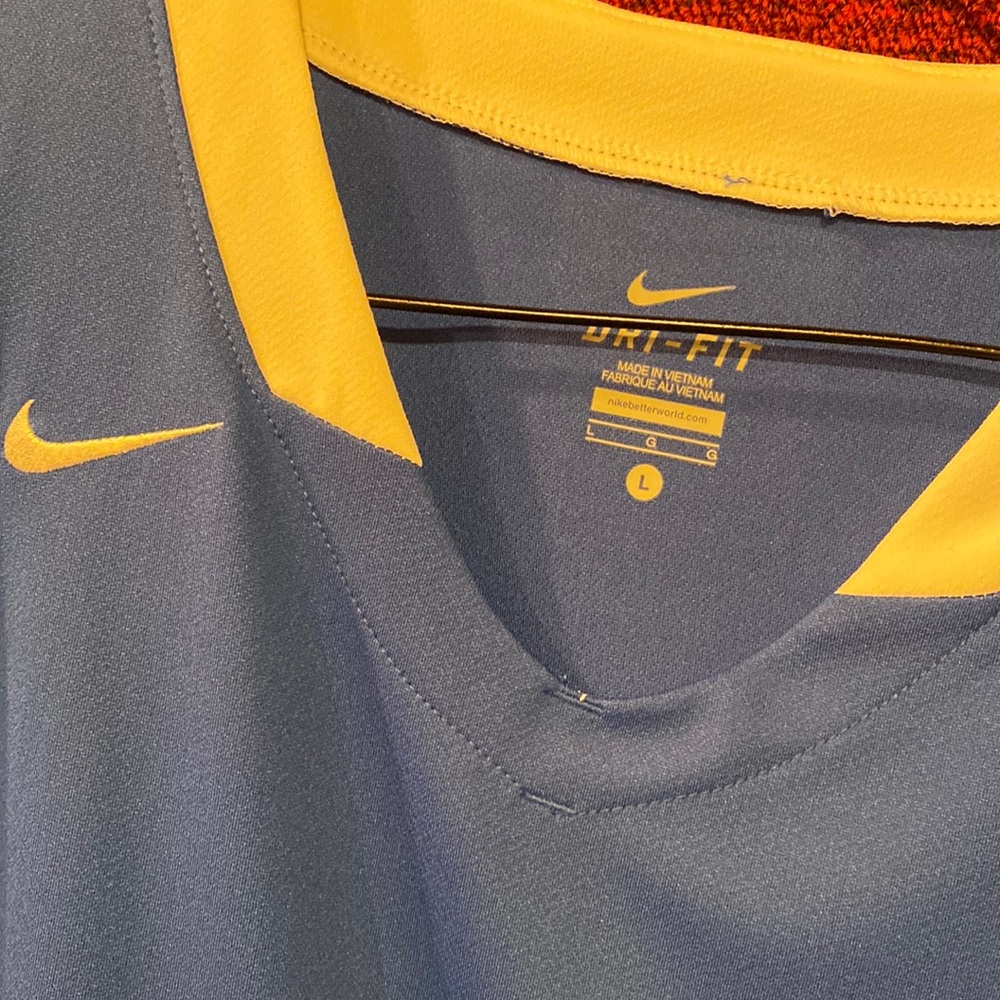 Nike Dri-Fit ladies sport shirt.